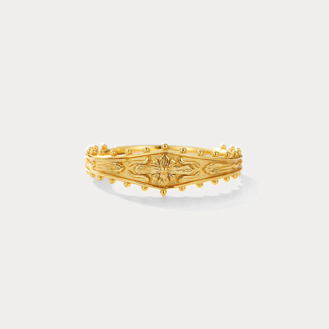 Elegant Grace: Embossed Brass Ring