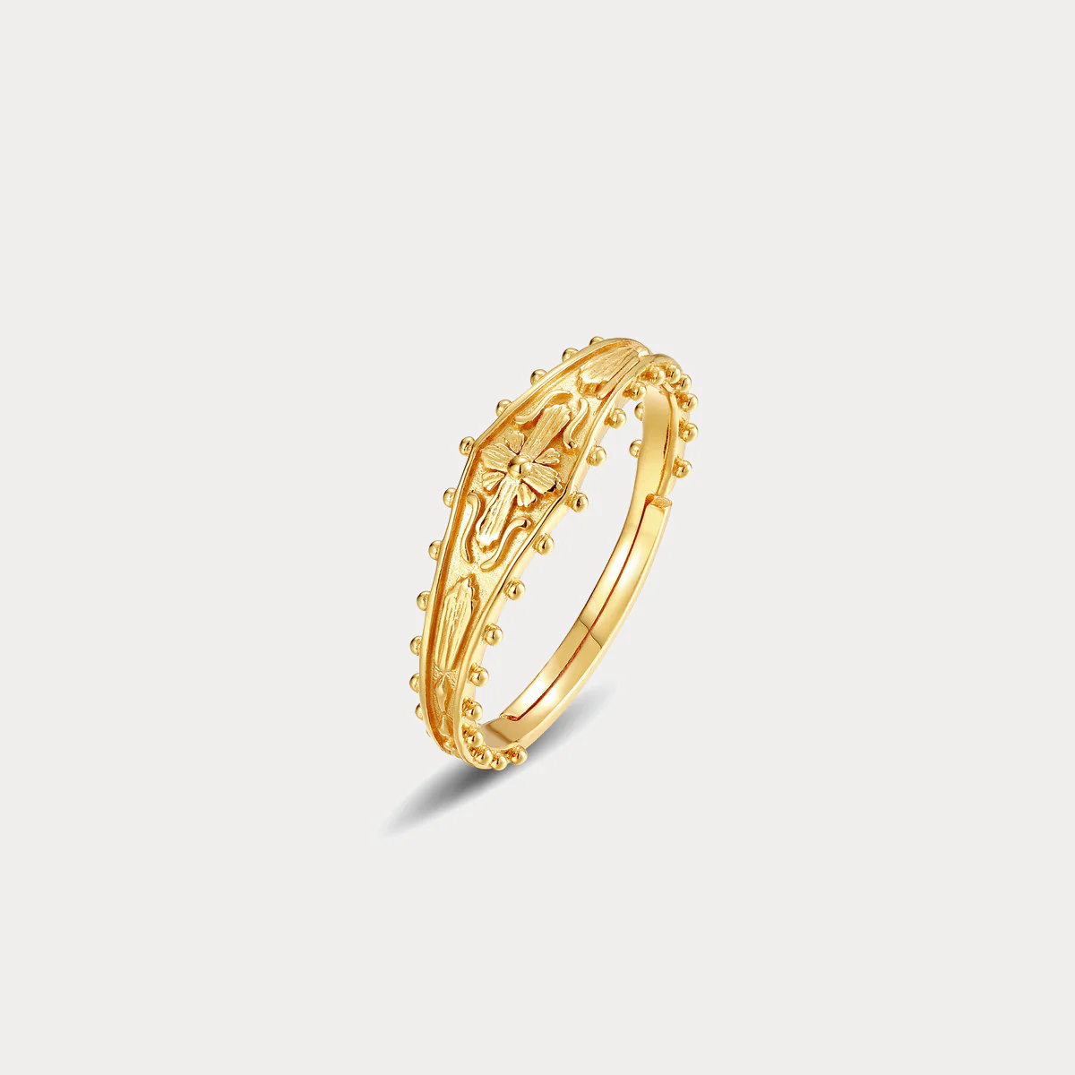Elegant Grace: Embossed Brass Ring